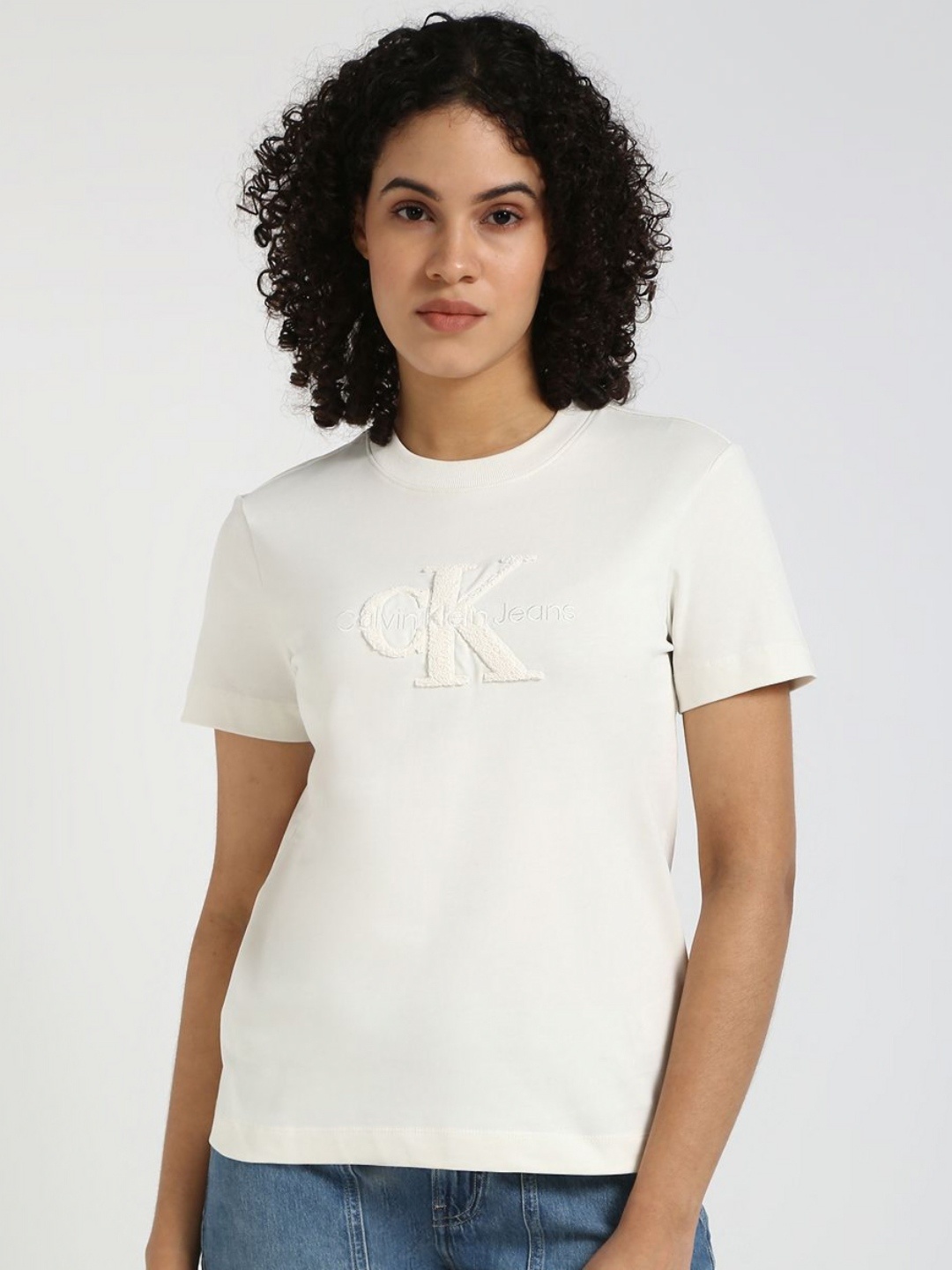 

Calvin Klein Jeans Women Typography Printed Round Neck Cotton T-shirt, White