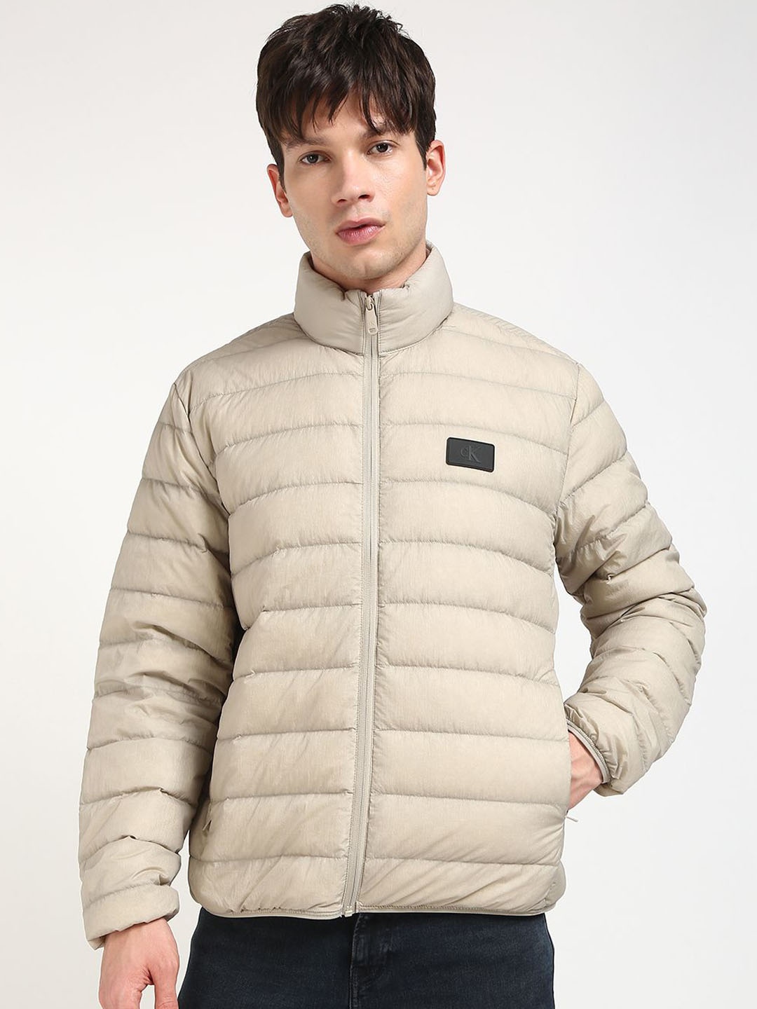 

Calvin Klein Jeans Men Mock Collar Solid Casual Puffer Jacket, Beige