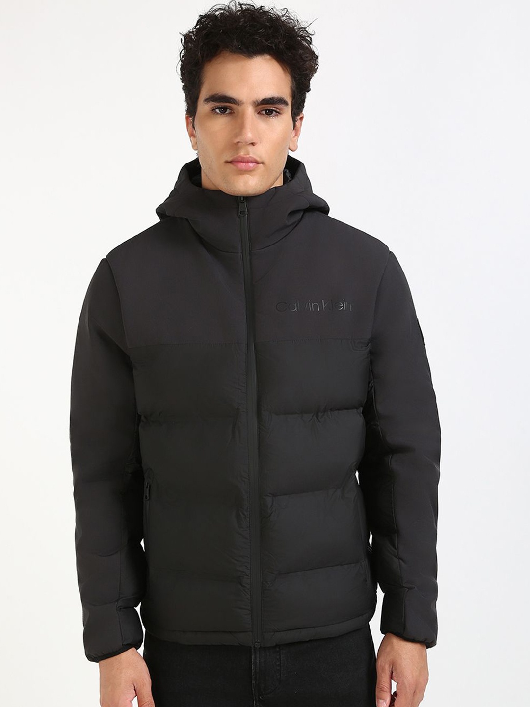 

Calvin Klein Jeans Men Hooded Solid Cotton Casual Puffer Jacket, Black