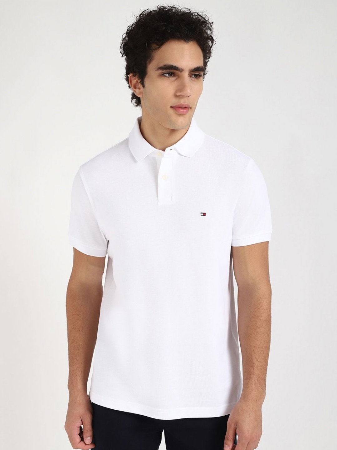 

Tommy Hilfiger Men Solid Polo Collar Cotton T-shirt, White