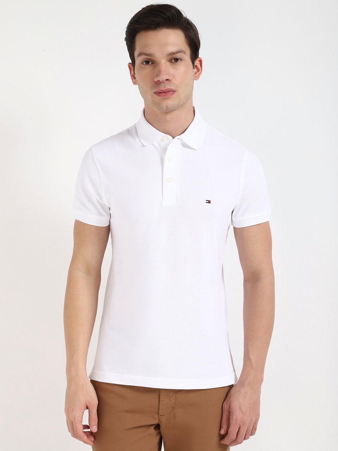 

Tommy Hilfiger Men IM CORE 1985 Solid Polo Collar Cotton Slim Fit T-shirt, White