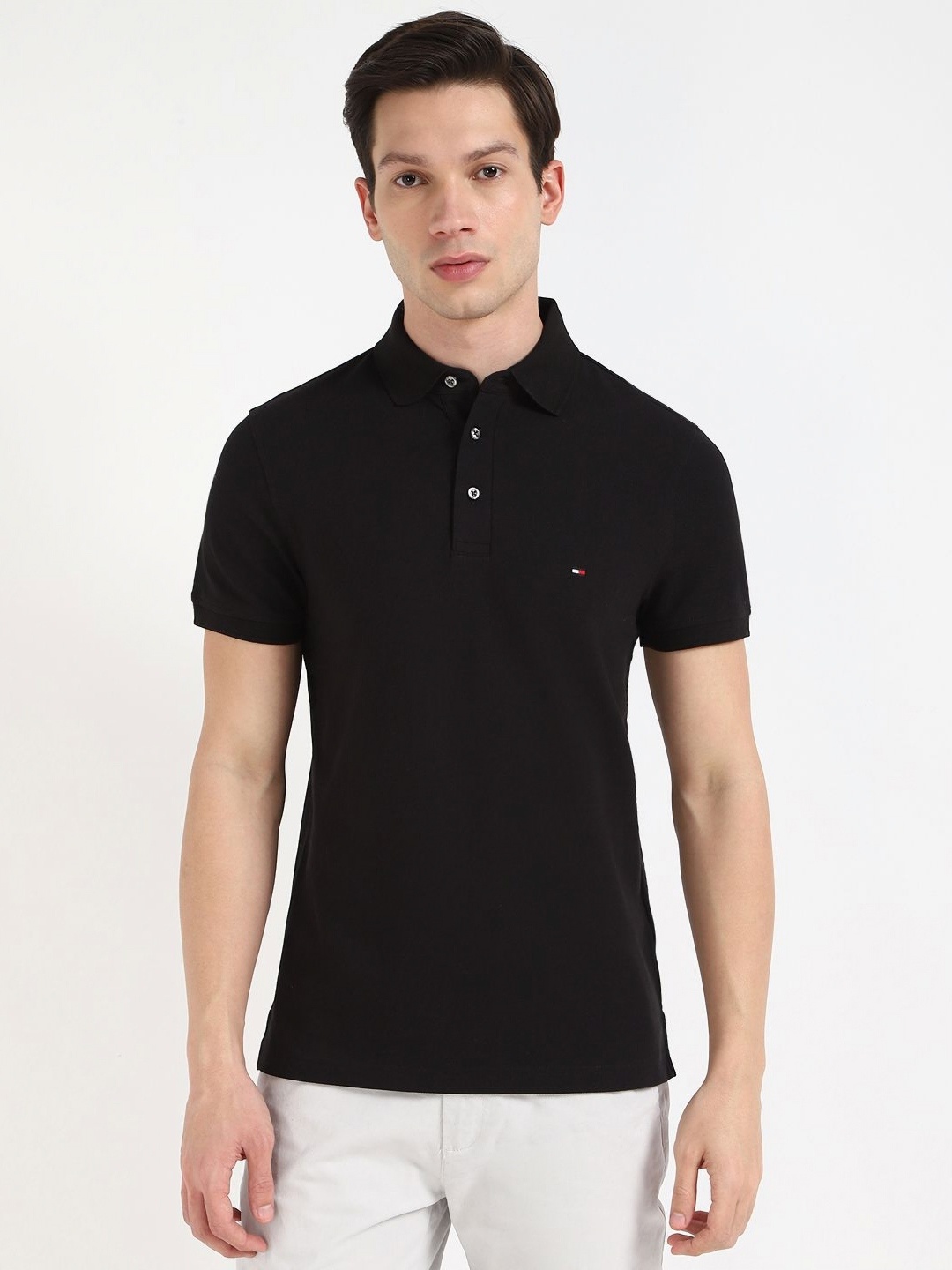 

Tommy Hilfiger Men Solid Polo Collar Cotton Slim Fit T-shirt, Black