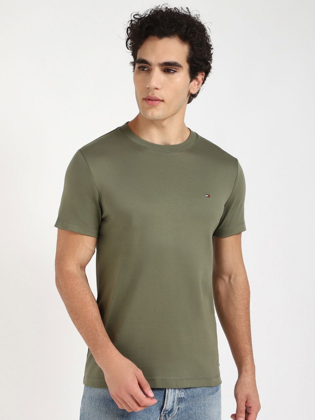 

Tommy Hilfiger Men Solid Round Neck Cotton T-shirt, Olive