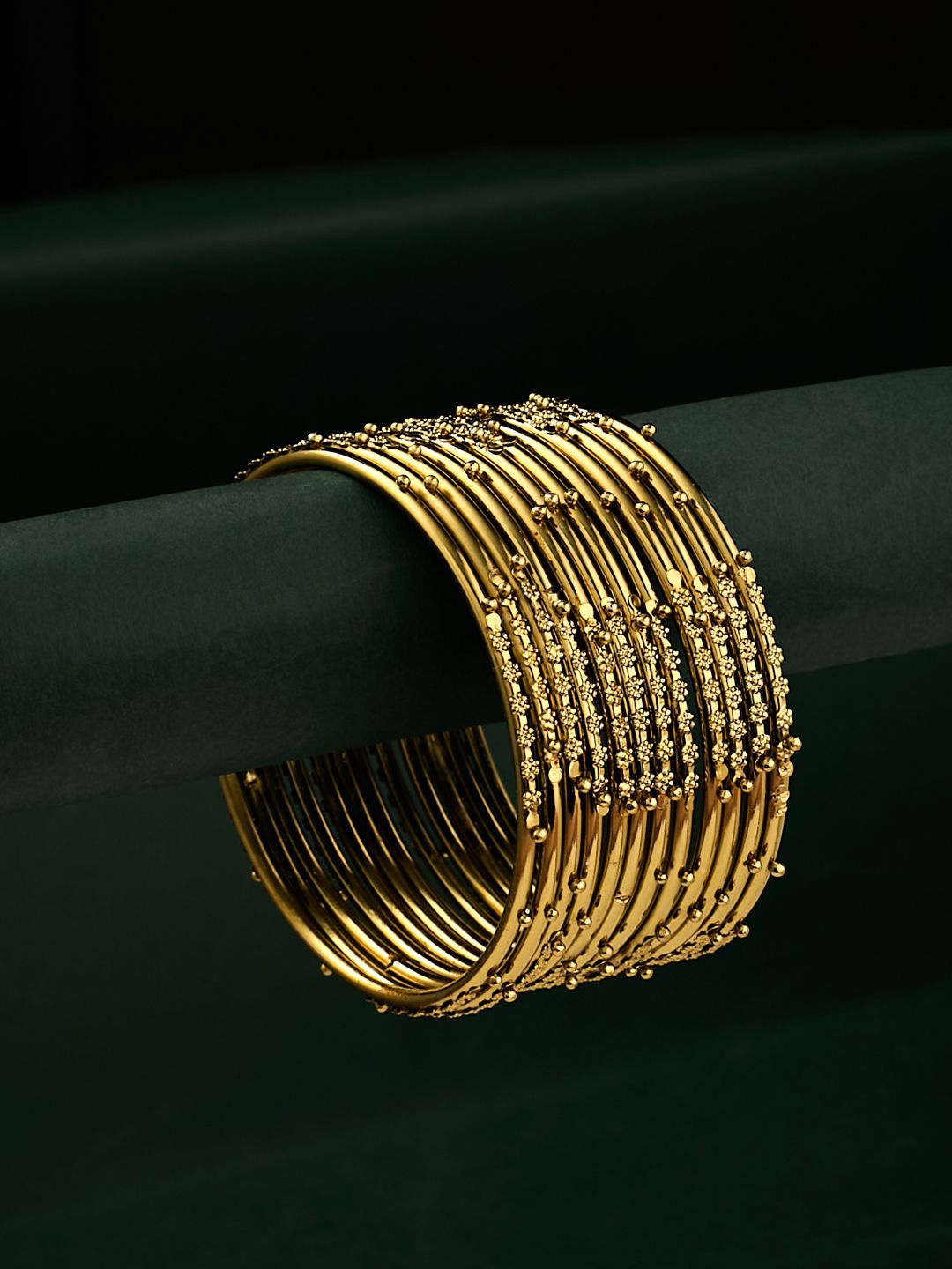 

ATIBELLE Set Of 12 Gold Plated Textured & Beaded Bangles