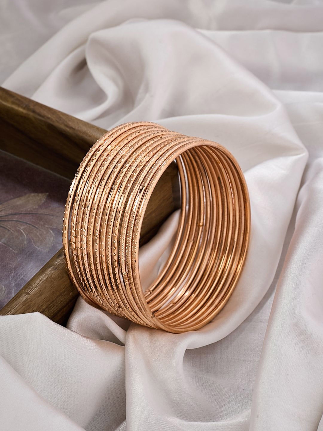 

ATIBELLE Set Of 12 Rose Gold-Plated Textured Bangles