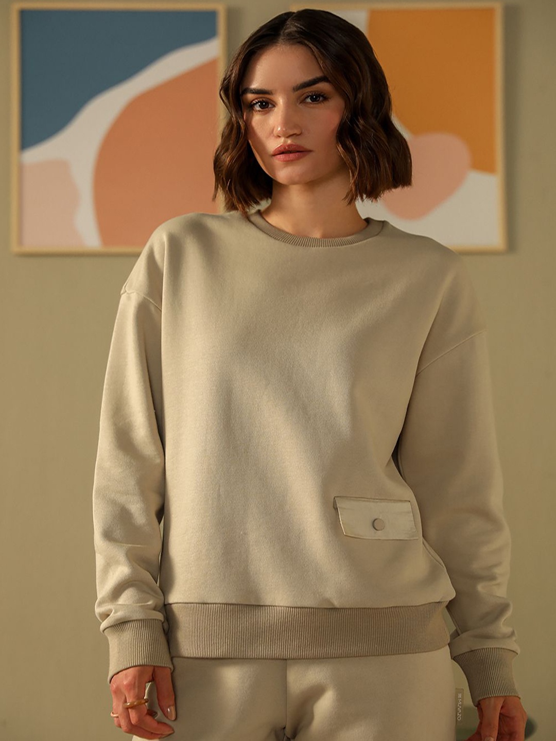 

Muvazo Women Round Neck Pocket Detailing Sweatshirt, Beige