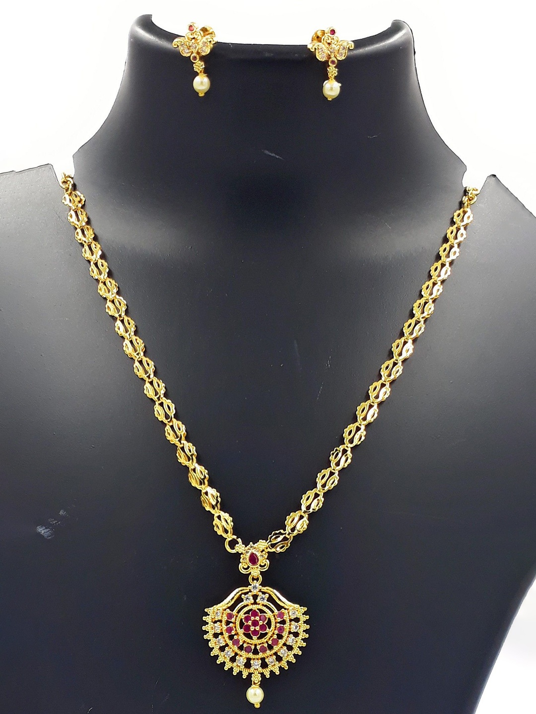 

Anujeet Fashion Hub Gold-Plated Stone-Studded Jewellery Set