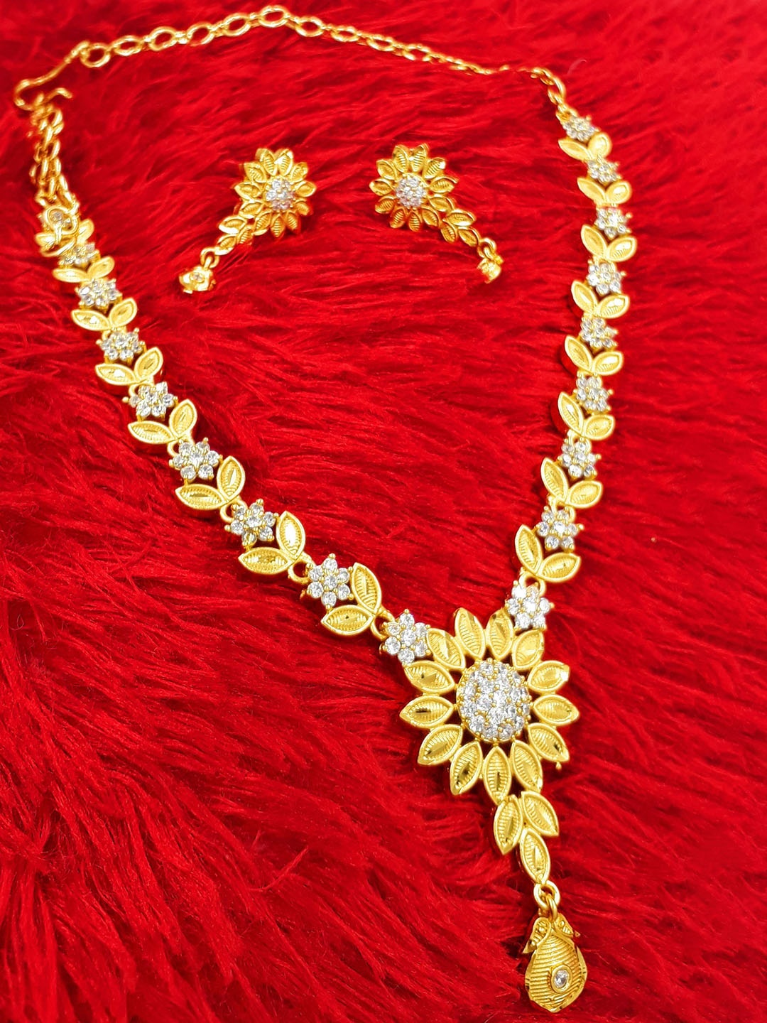 

Anujeet Fashion Hub Gold Plated Stone Studded Jewellery Set