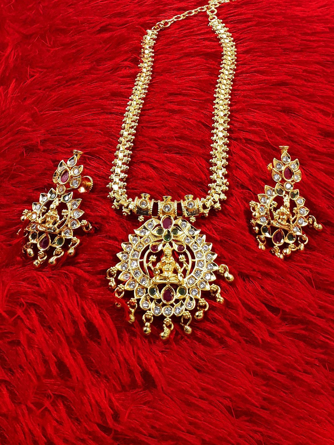 

Anujeet Fashion Hub Gold-Plated Stone-Studded Temple Jewellery Set