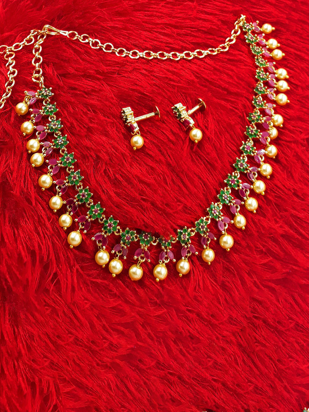 

Anujeet Fashion Hub Gold Plated Stones Studded & Beaded Jewellery Set