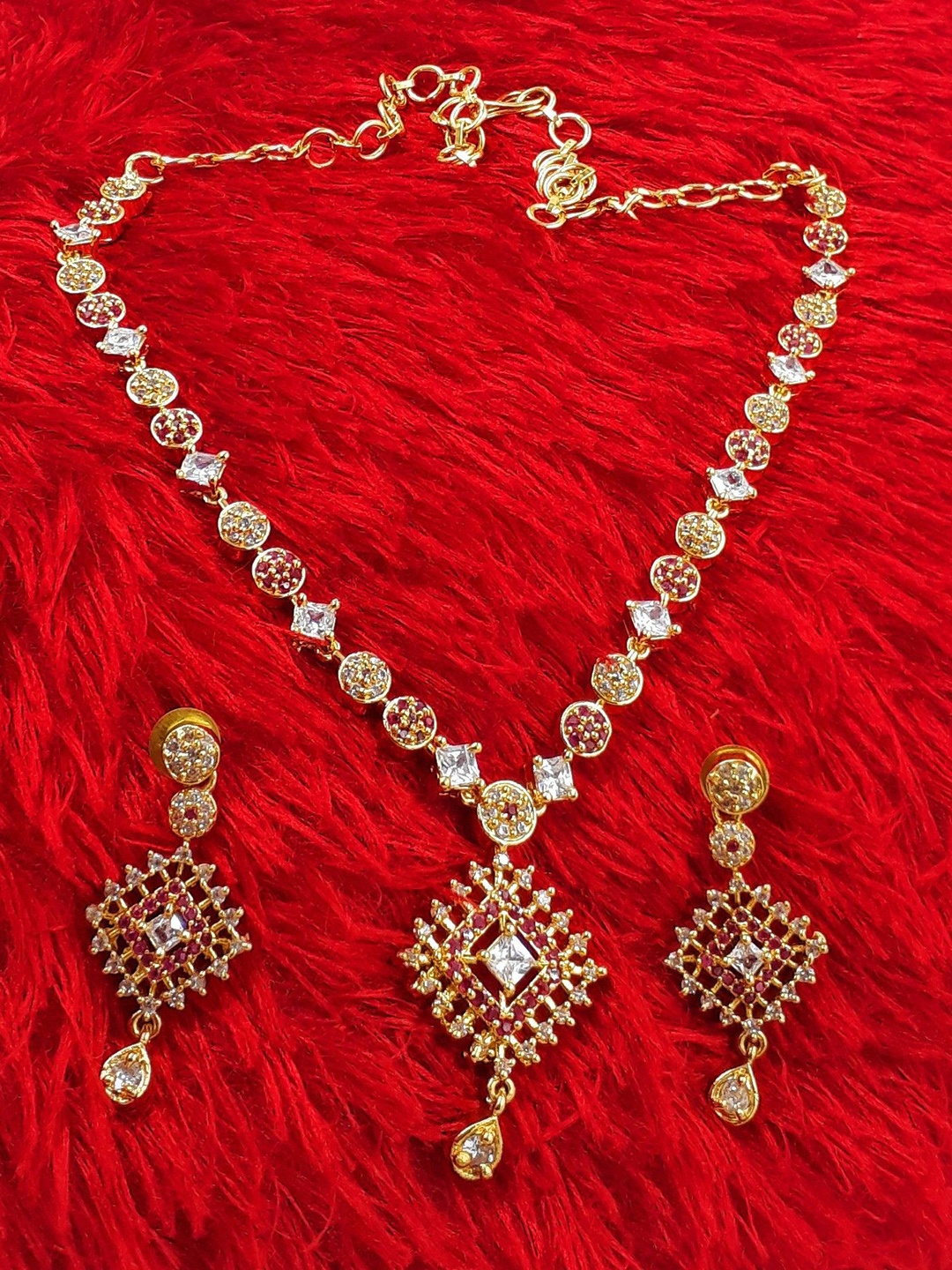 

Anujeet Fashion Hub Gold-Plated Stone Studded Jewellery Set