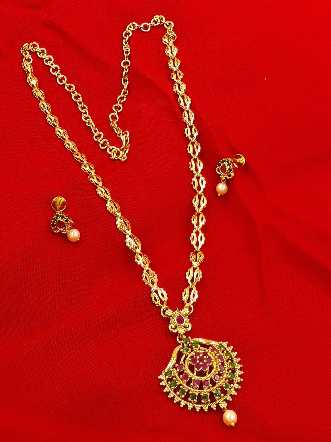 

Anujeet Fashion Hub Gold Plated Stones Studded & Beaded Jewellery Set