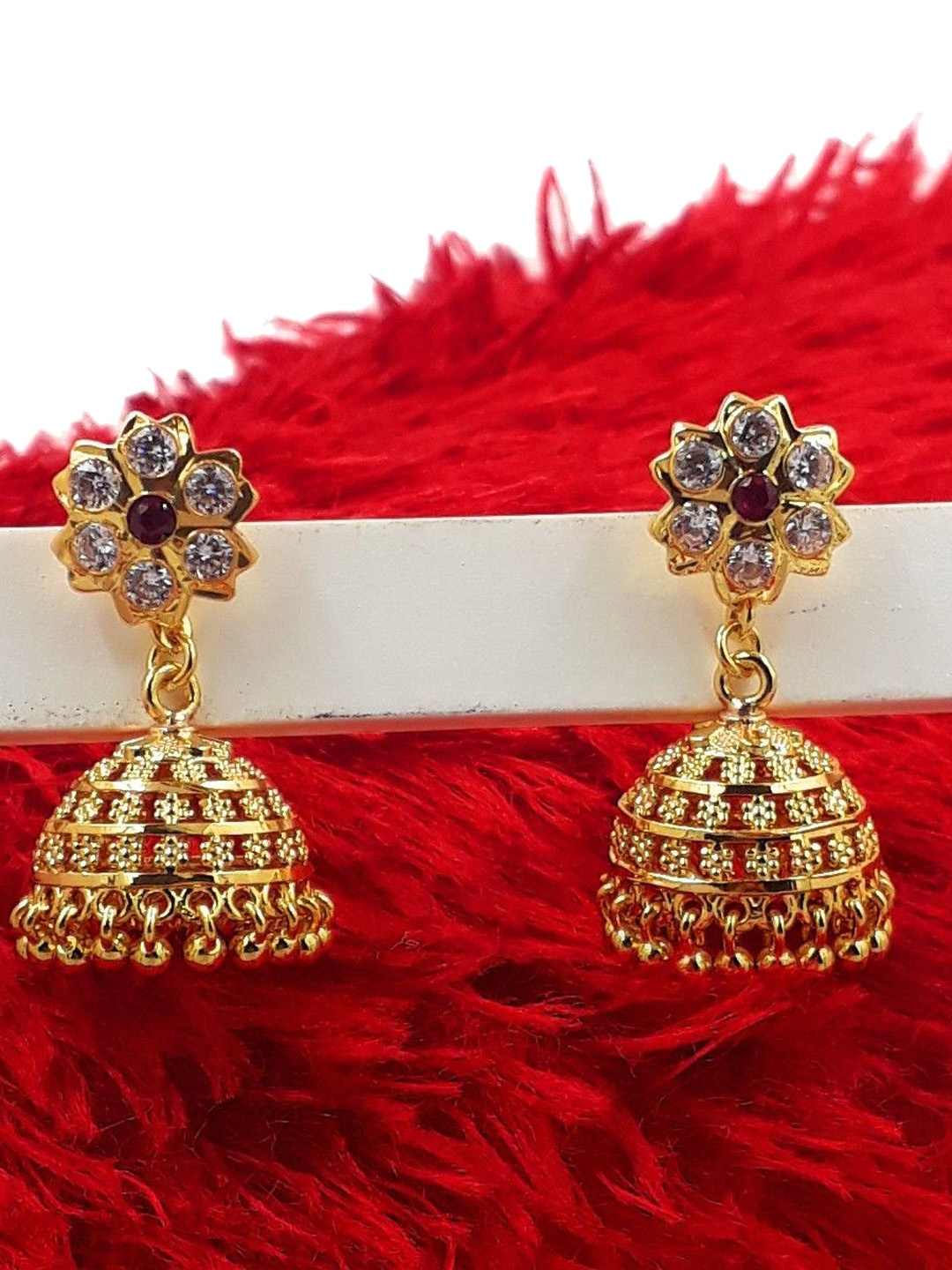 

Anujeet Fashion Hub Gold-Plated American Diamond Studded Contemporary Jhumkas