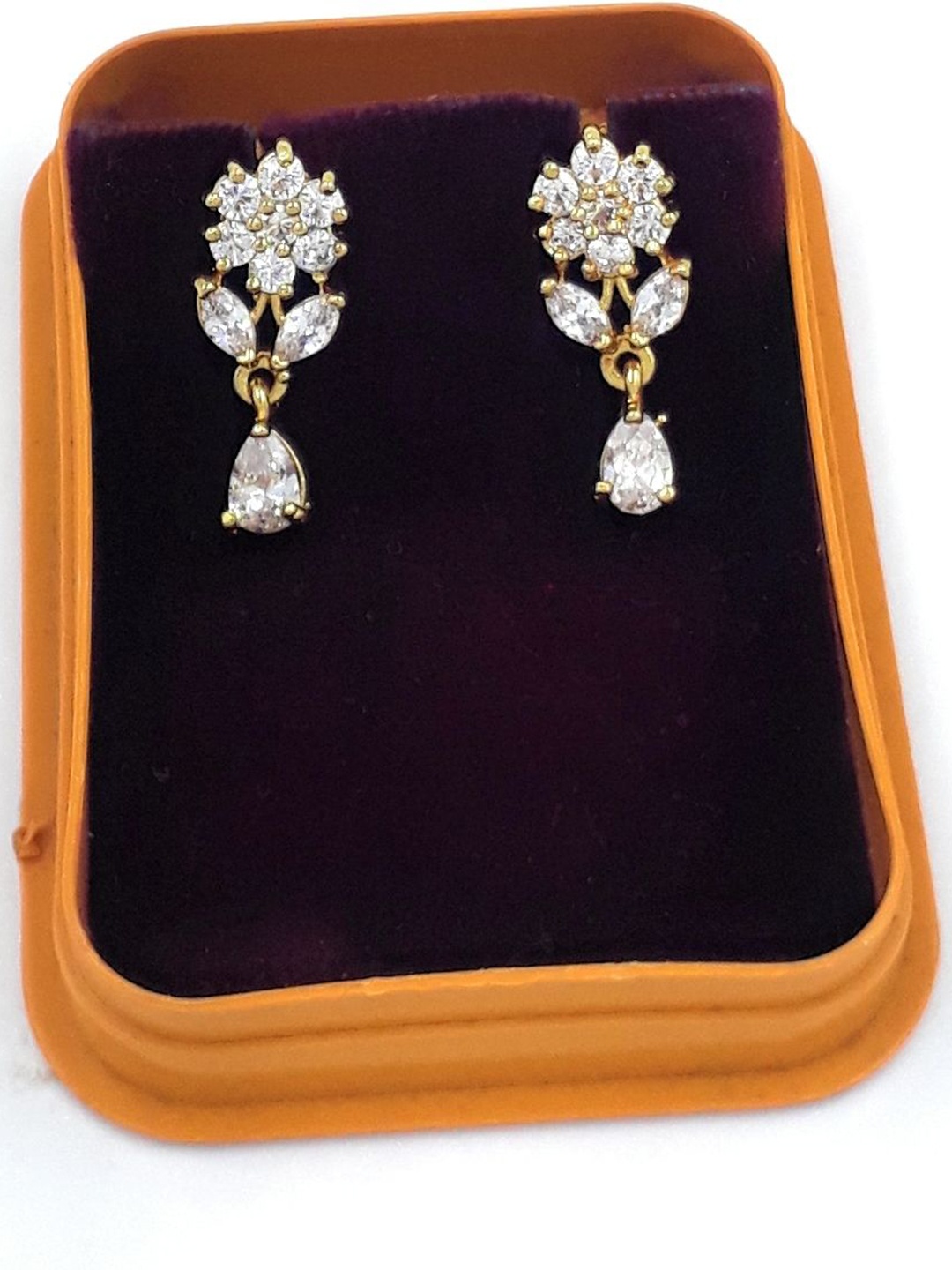 

Anujeet Fashion Hub Gold-Plated American Diamond Studded Contemporary Drop Earrings