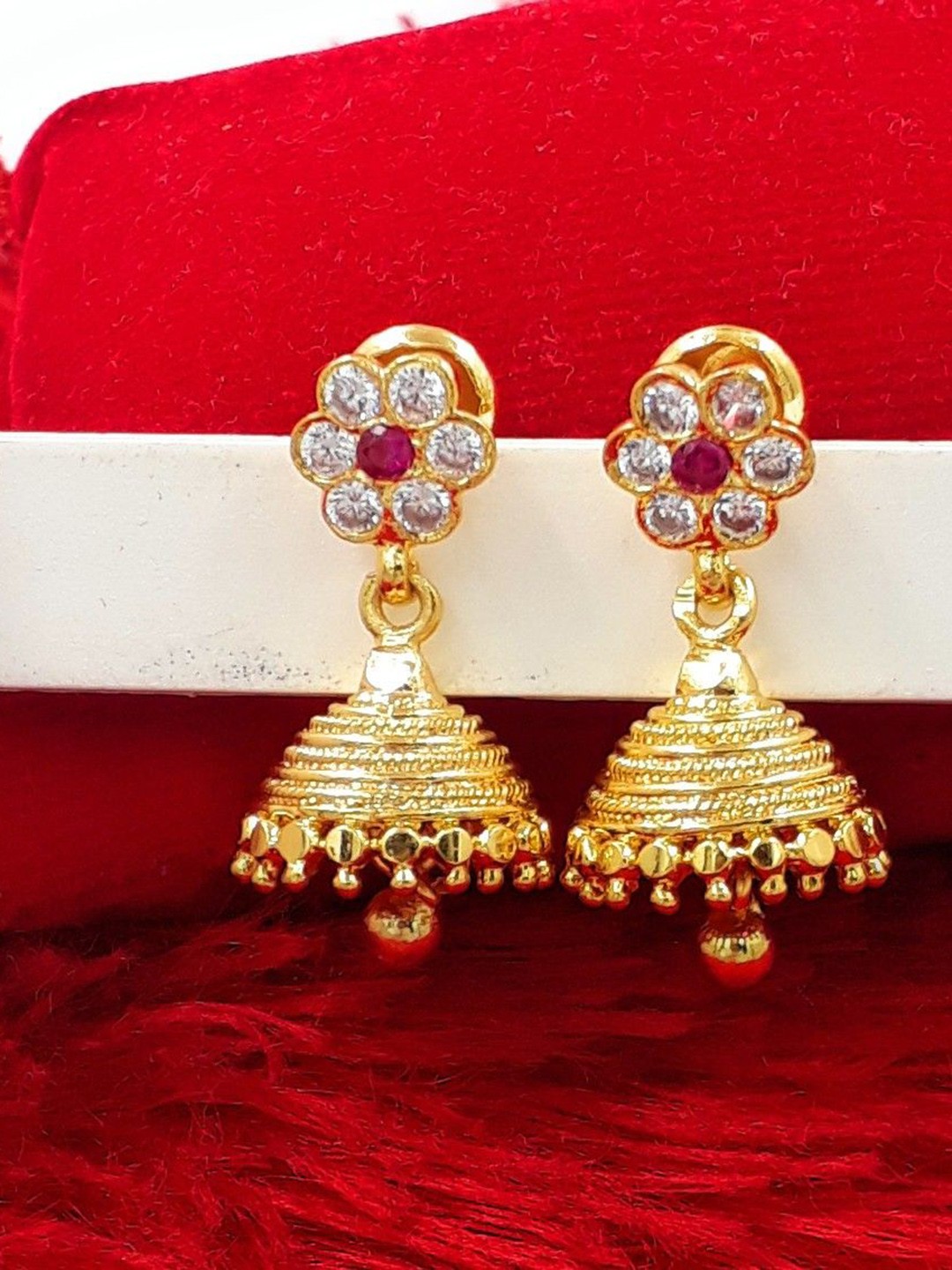 

Anujeet Fashion Hub Gold-Plated American Diamond Studded Dome Shaped Jhumkas