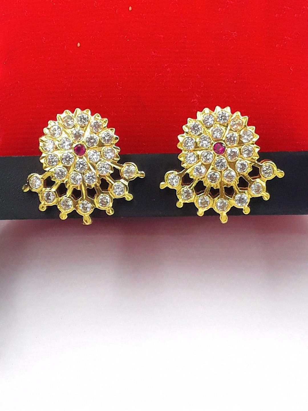 

Anujeet Fashion Hub Gold-Plated American Diamond Studded Contemporary Studs Earrings