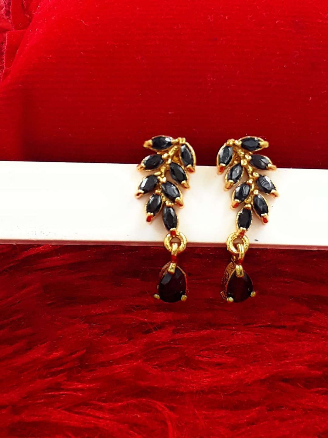 

Anujeet Fashion Hub Gold-Plated American Diamond Studded Leaf Shaped Drop Earrings