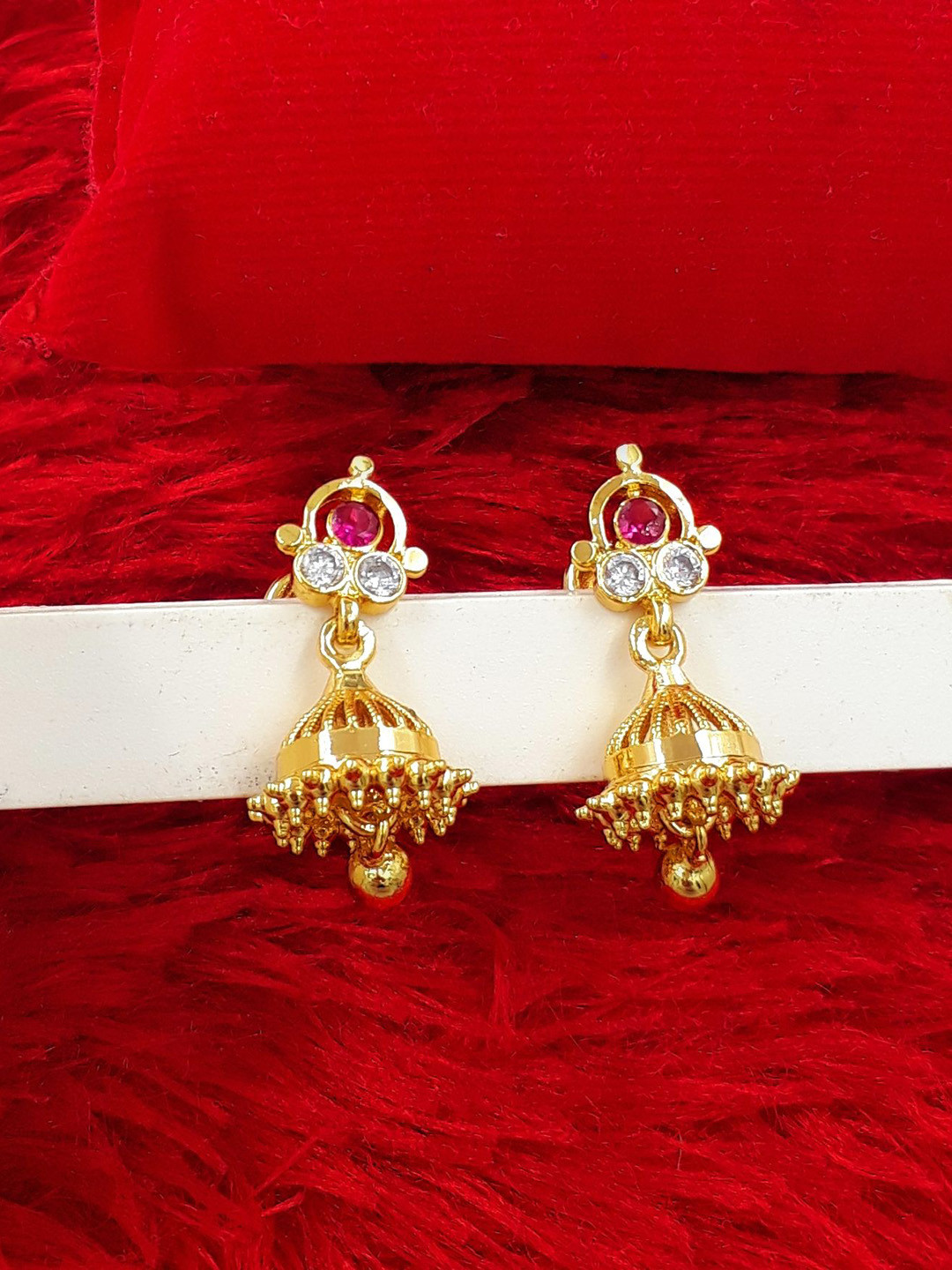 

Anujeet Fashion Hub Gold-Plated American Diamond Studded Contemporary Jhumkas