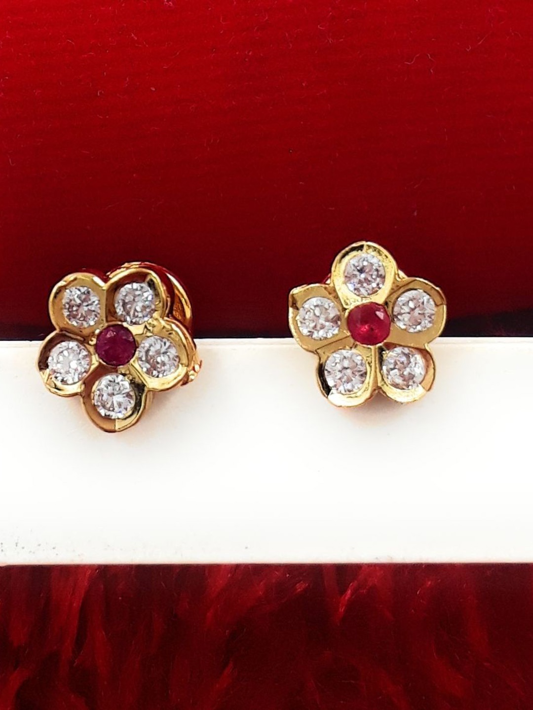 

Anujeet Fashion Hub Gold-Plated American Diamond Studded Floral Studs Earrings