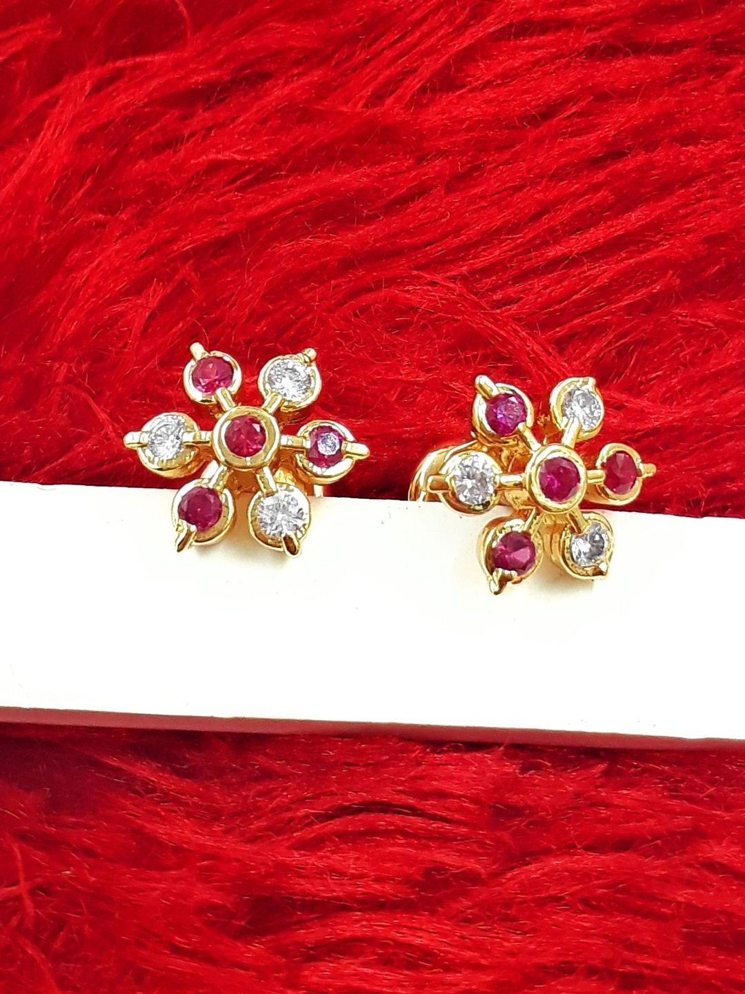 

Anujeet Fashion Hub Gold Plated AD Studded Floral Shaped Studs