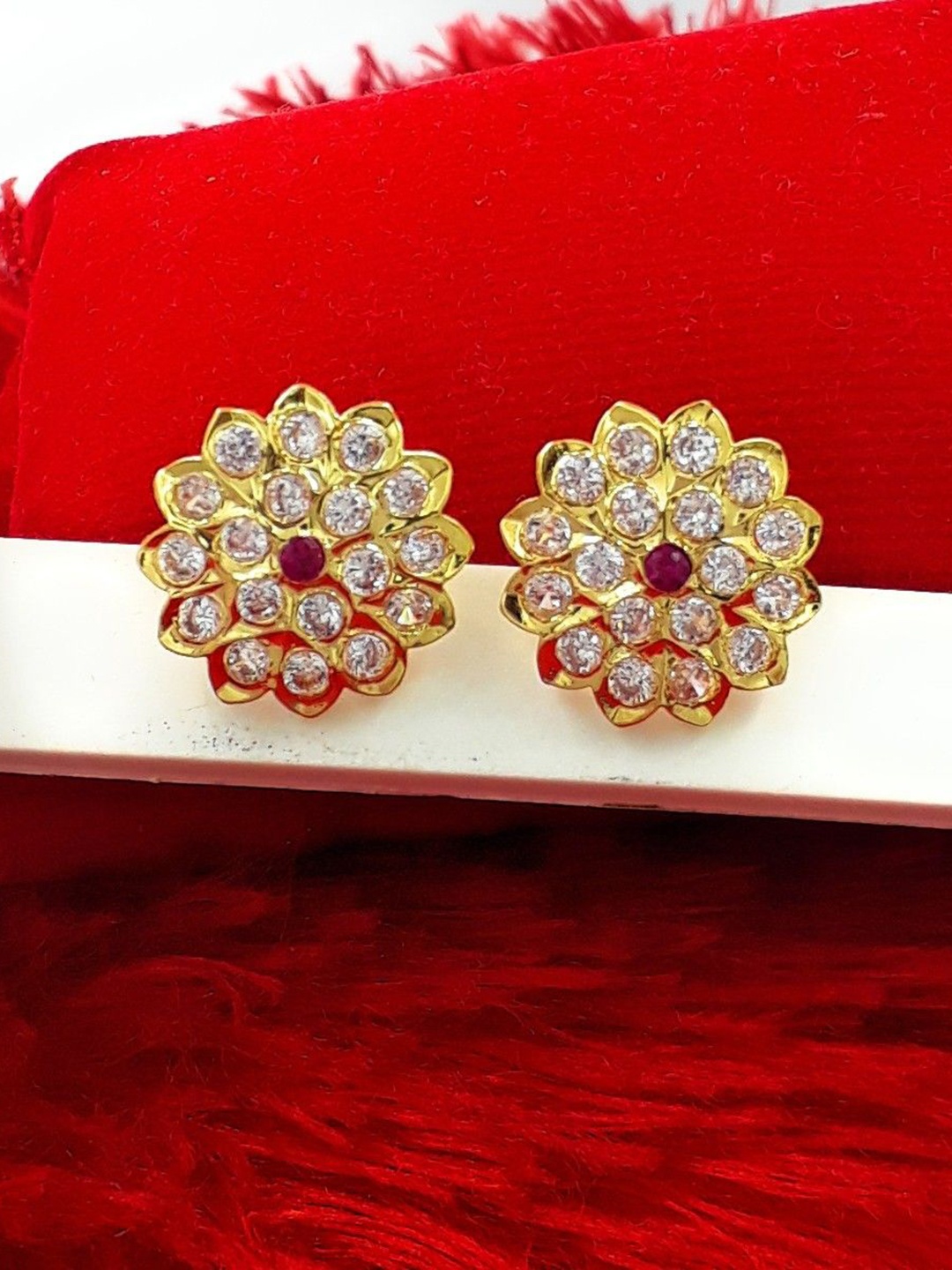 

Anujeet Fashion Hub Gold Plated AD Studded Floral Shaped Studs