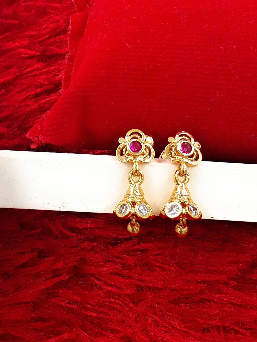 

Anujeet Fashion Hub Gold-Plated American Diamond Studded Floral Jhumkas