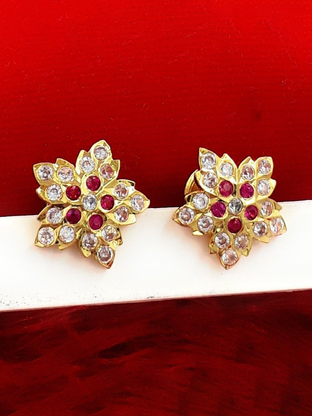 

Anujeet Fashion Hub Gold Plated AD Studded Floral Shaped Studs