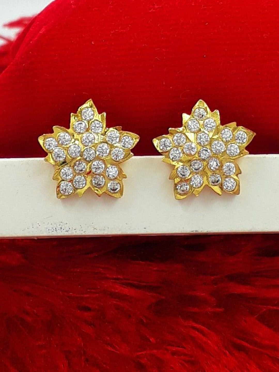 

Anujeet Fashion Hub Gold-Plated American Diamond Stones Studded Floral Shaped Studs