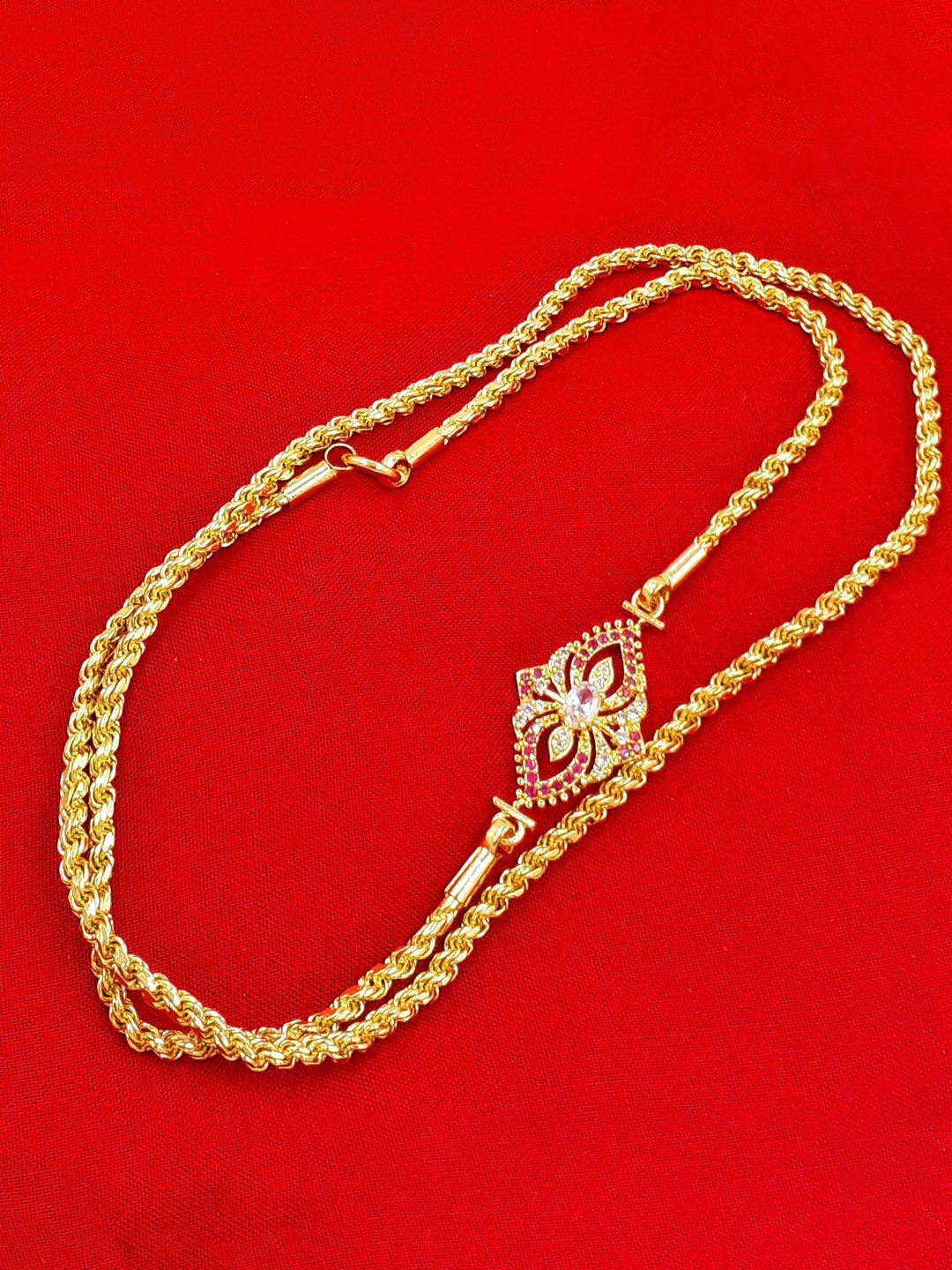 

Anujeet Fashion Hub Gold-Plated AD Studded Mop Chain