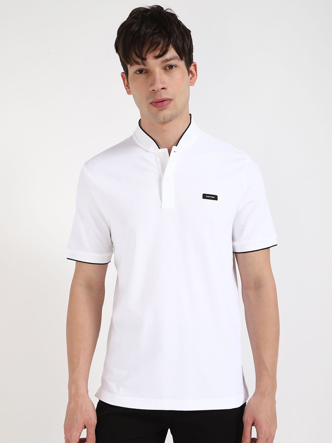 

Calvin Klein Jeans Men Solid Mandarin Collar Cotton T-shirt, White