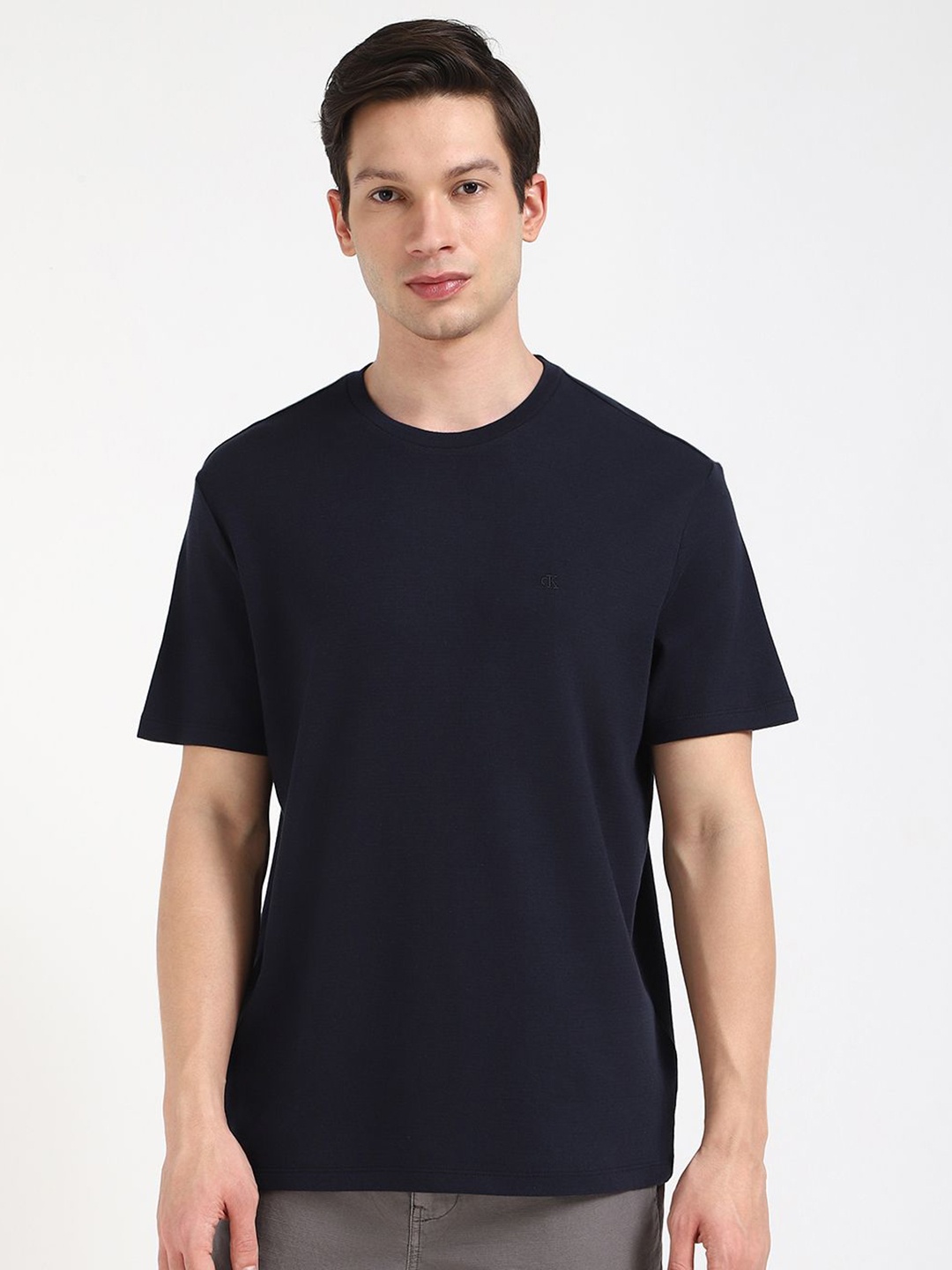 

Calvin Klein Jeans Men Solid Round Neck Cotton T-shirt, Navy blue