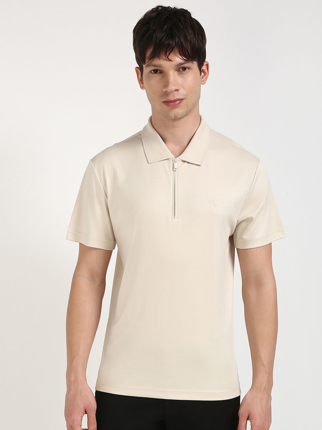 

Calvin Klein Jeans Men Solid Polo Collar Cotton T-shirt, Beige