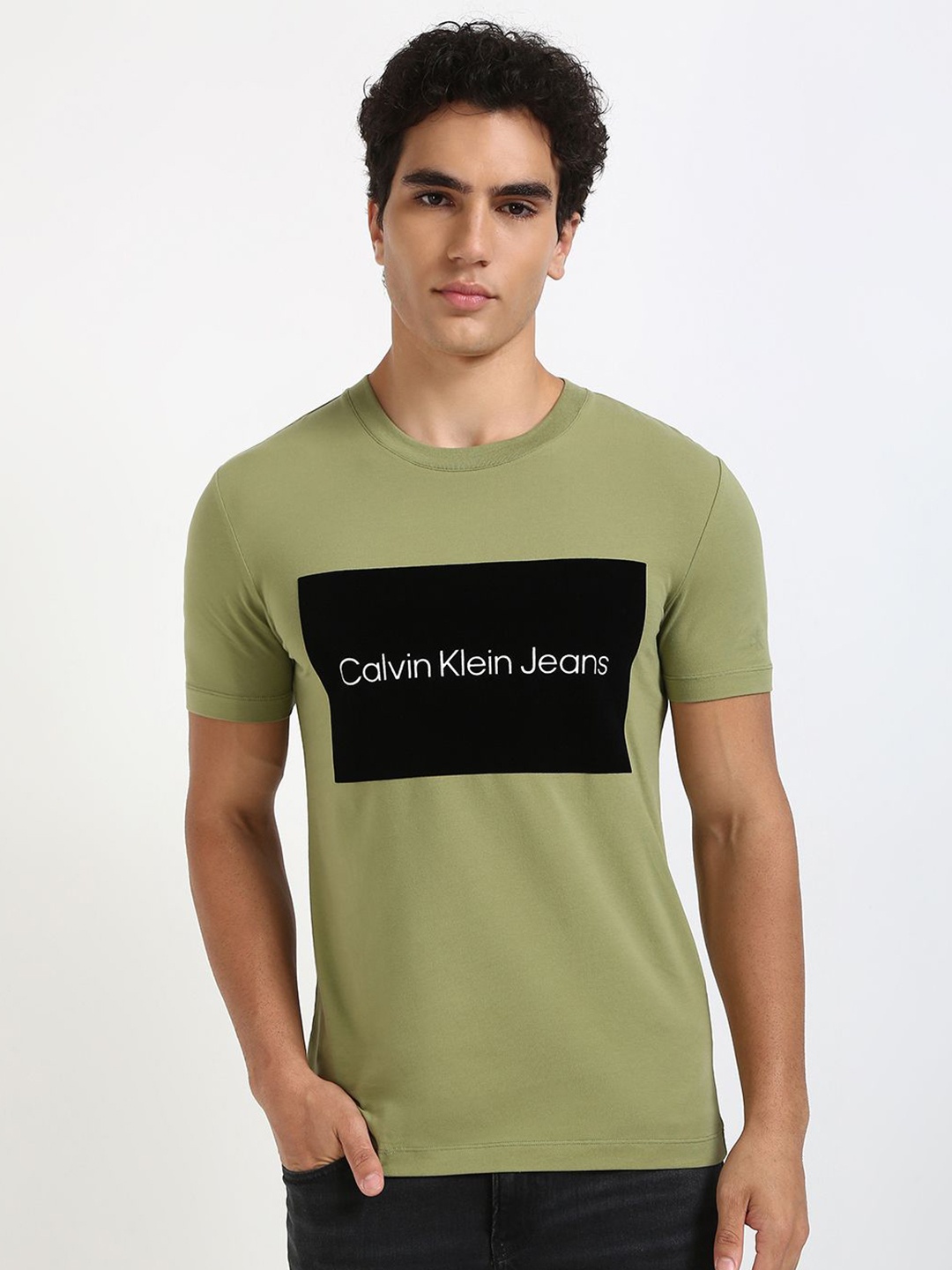 

Calvin Klein Jeans Men Typography Printed Round Neck Cotton T-shirt, Green