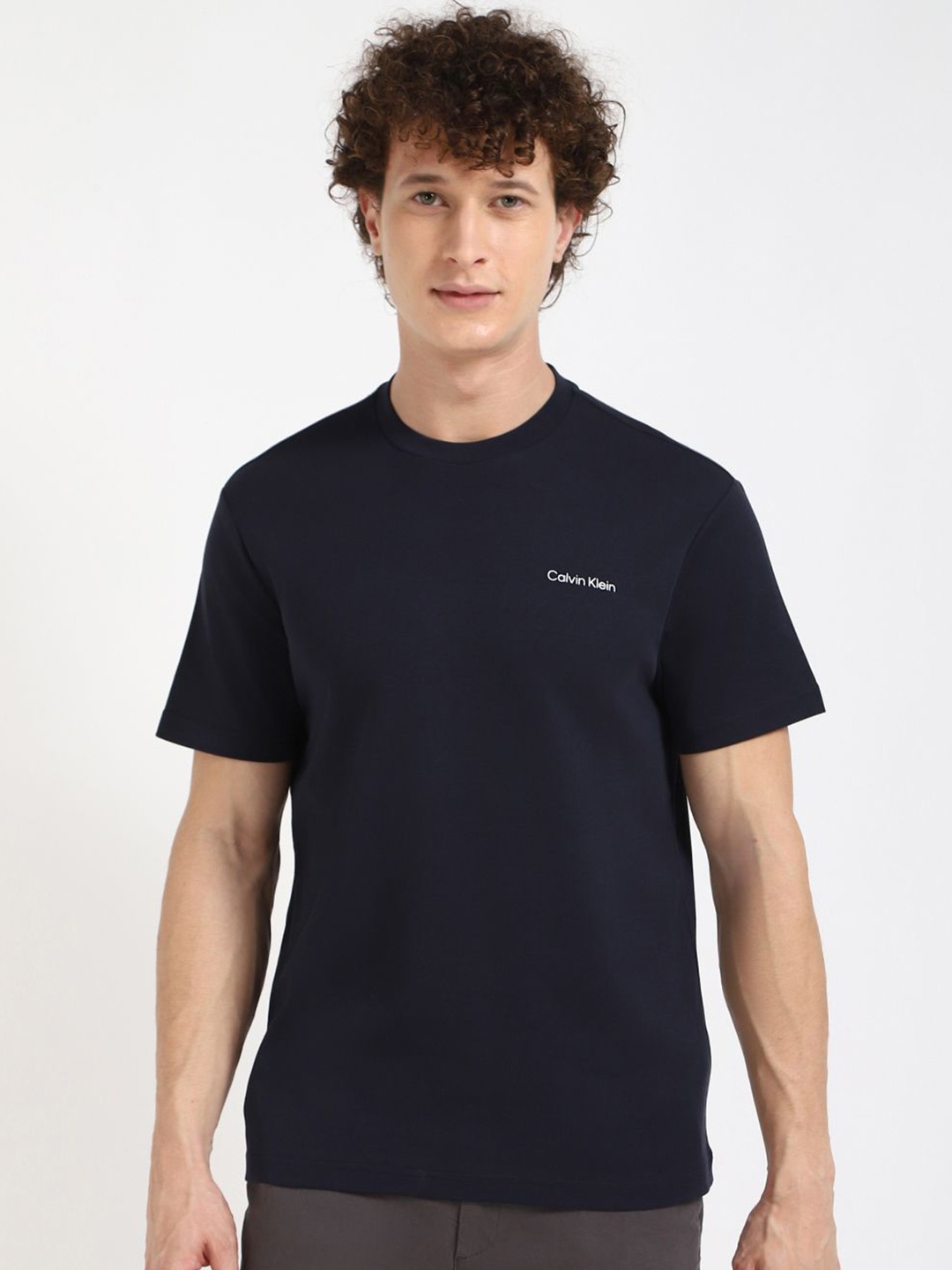 

Calvin Klein Jeans Men INTERLOCK Solid Round Neck Cotton T-shirt, Navy blue