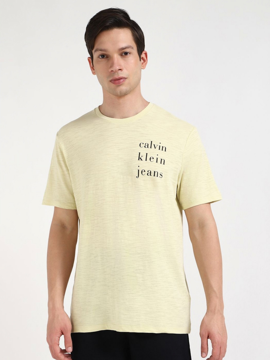 

Calvin Klein Jeans Men Typography Printed Round Neck Cotton T-shirt, Beige