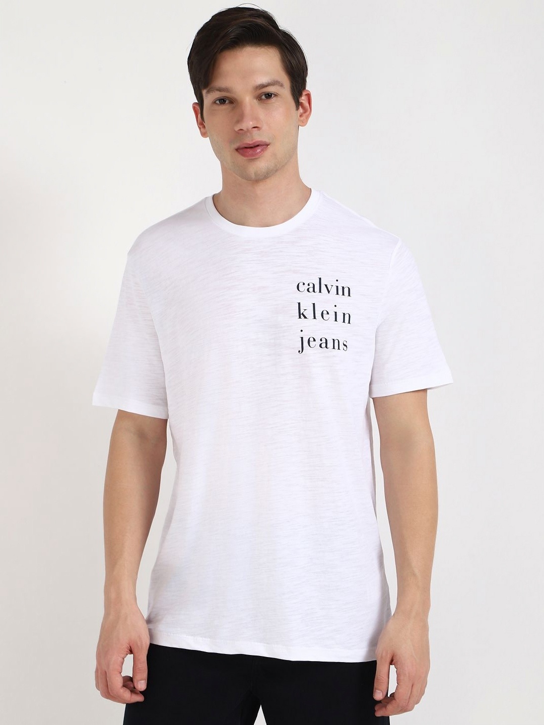 

Calvin Klein Jeans Men Typography Printed Round Neck Cotton T-shirt, White