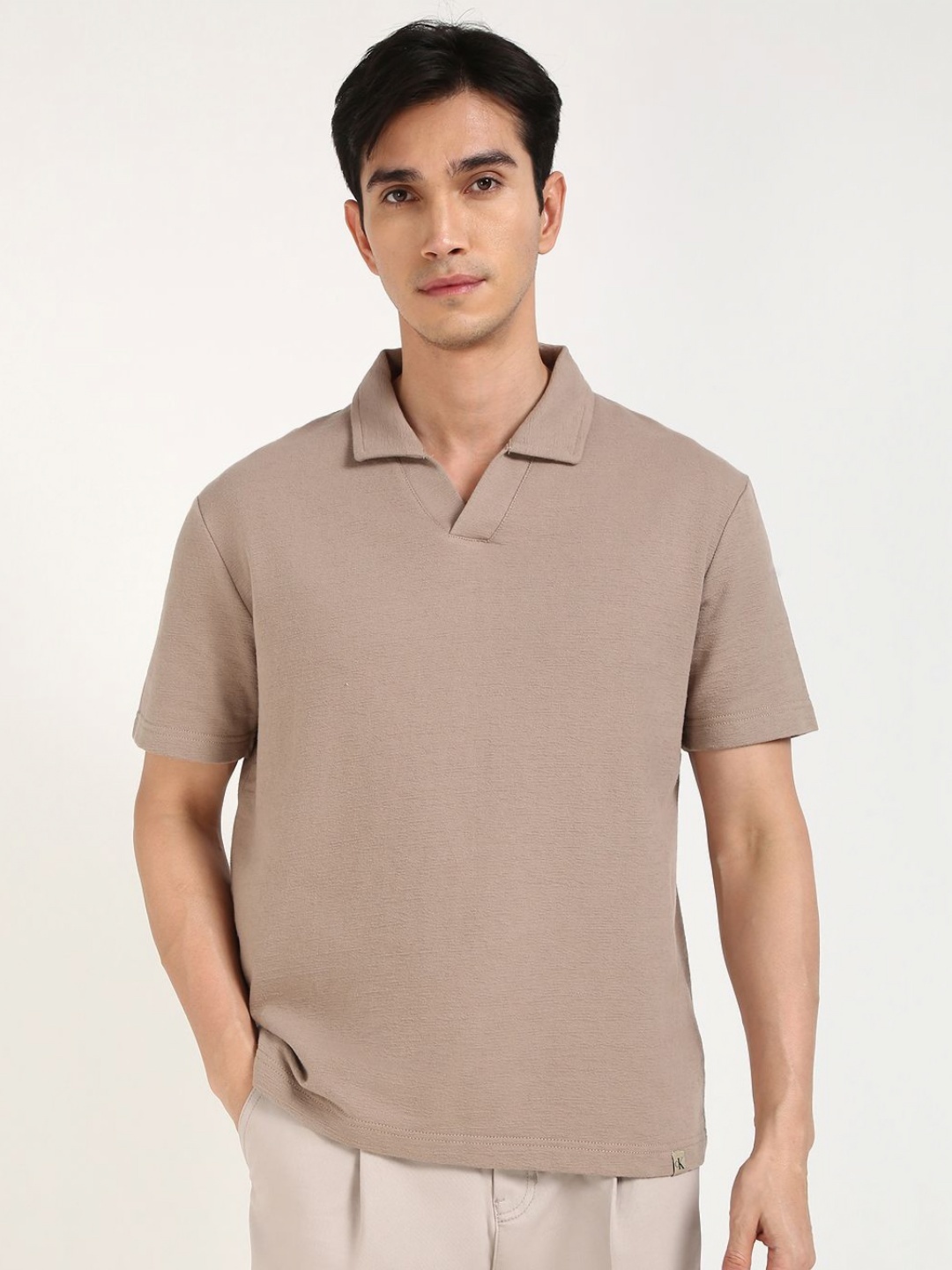 

Calvin Klein Jeans Men Solid Polo Collar Cotton T-shirt, Beige