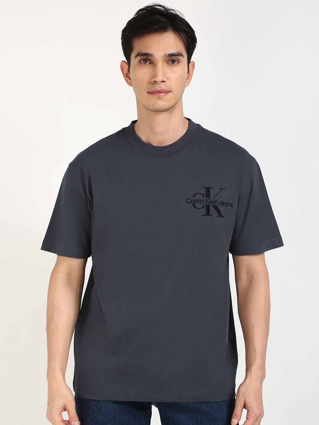 

Calvin Klein Jeans Men Typography Printed Round Neck Cotton T-shirt, Navy blue