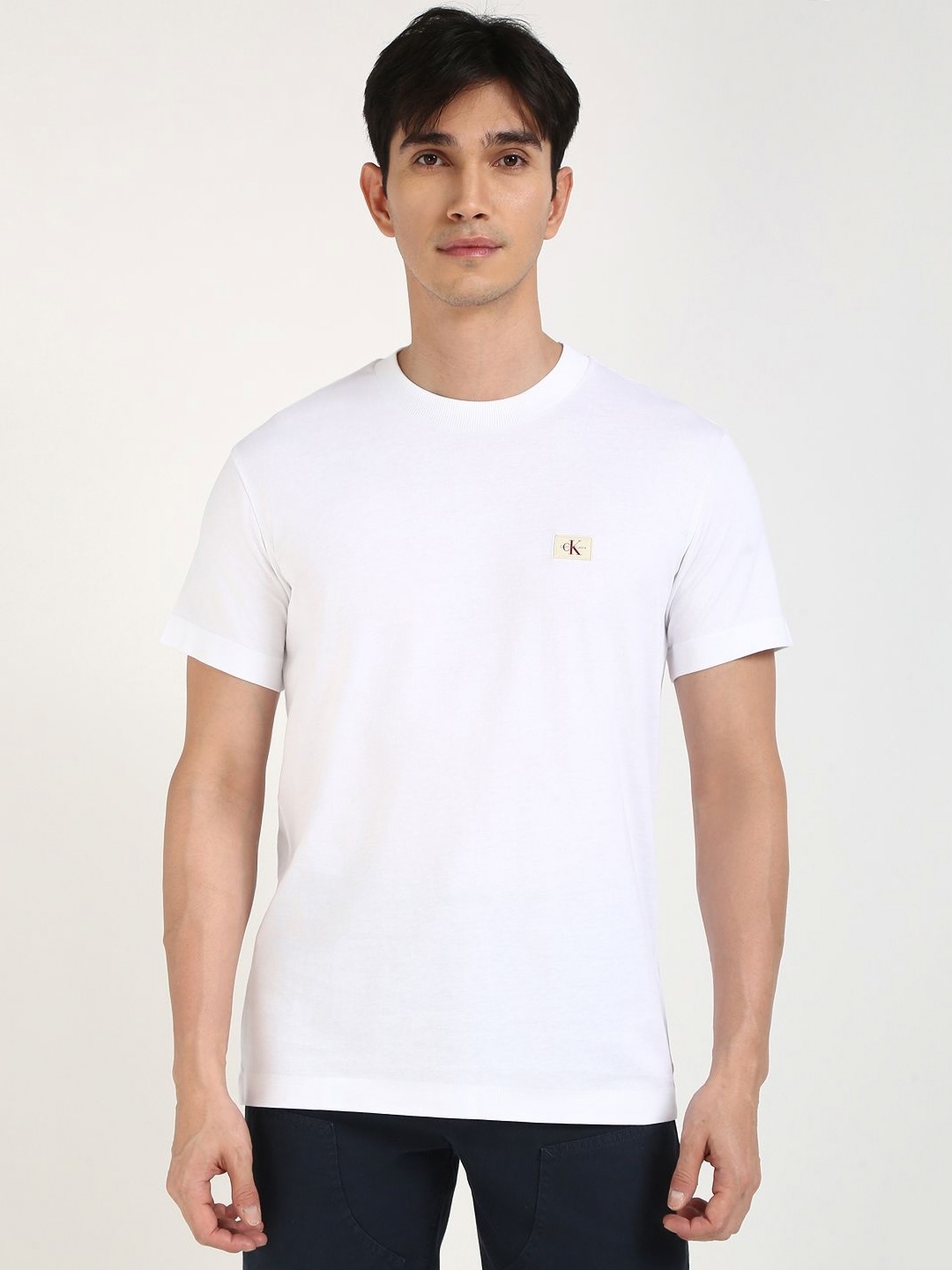 

Calvin Klein Jeans Men Solid Round Neck Cotton T-shirt, White