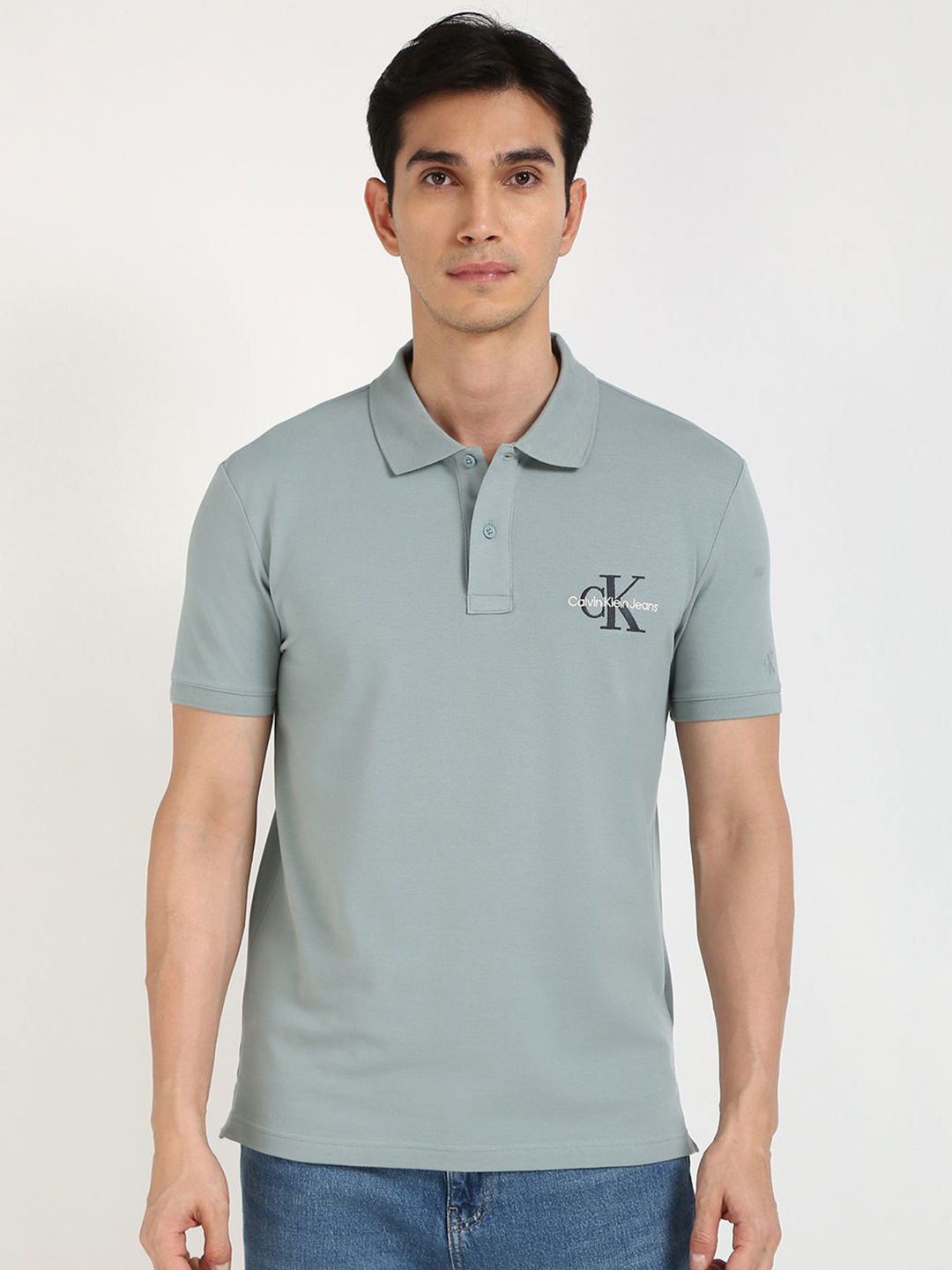 

Calvin Klein Jeans Men Solid Polo Collar Cotton T-shirt, Green