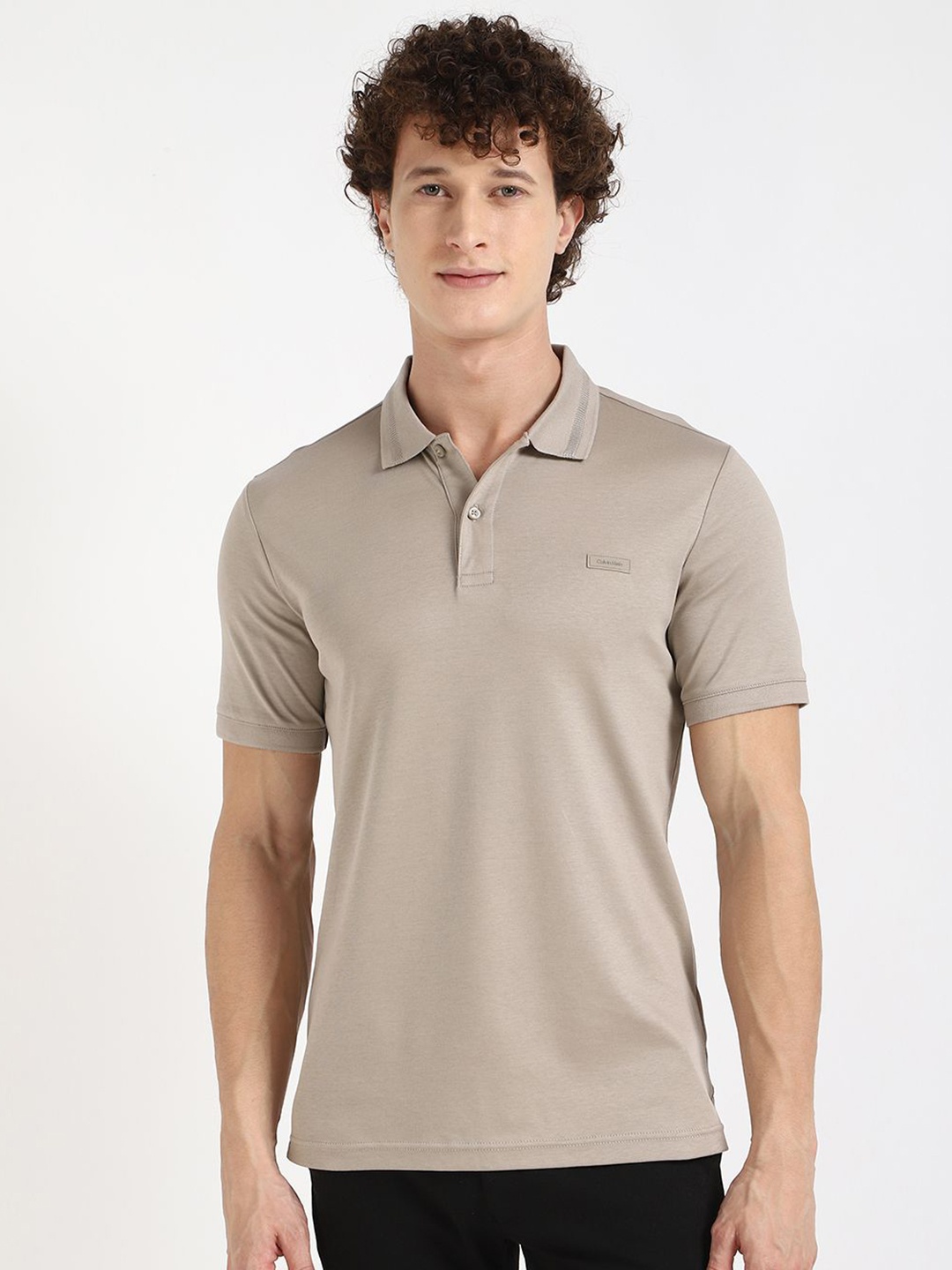

Calvin Klein Jeans Men Solid Polo Collar Slim Fit Cotton T-shirt, Beige