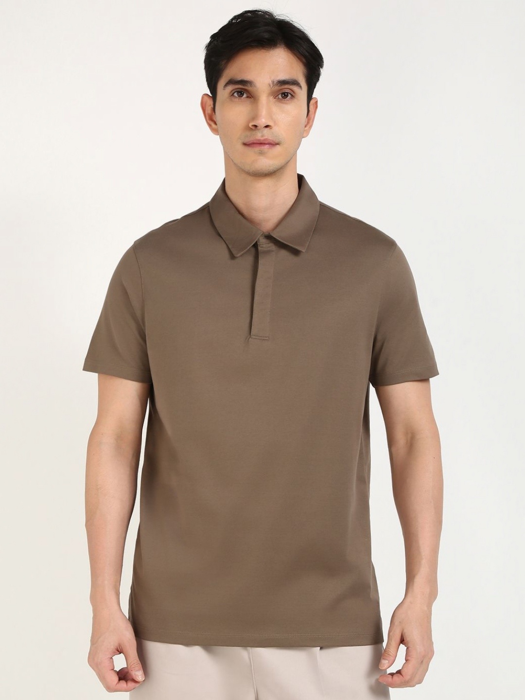 

Calvin Klein Jeans Men Solid Polo Collar Cotton T-shirt, Brown
