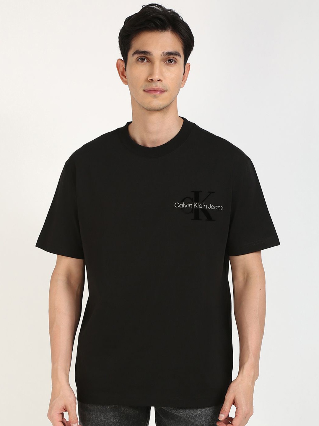 

Calvin Klein Jeans Men Typography Printed Round Neck Cotton T-shirt, Black