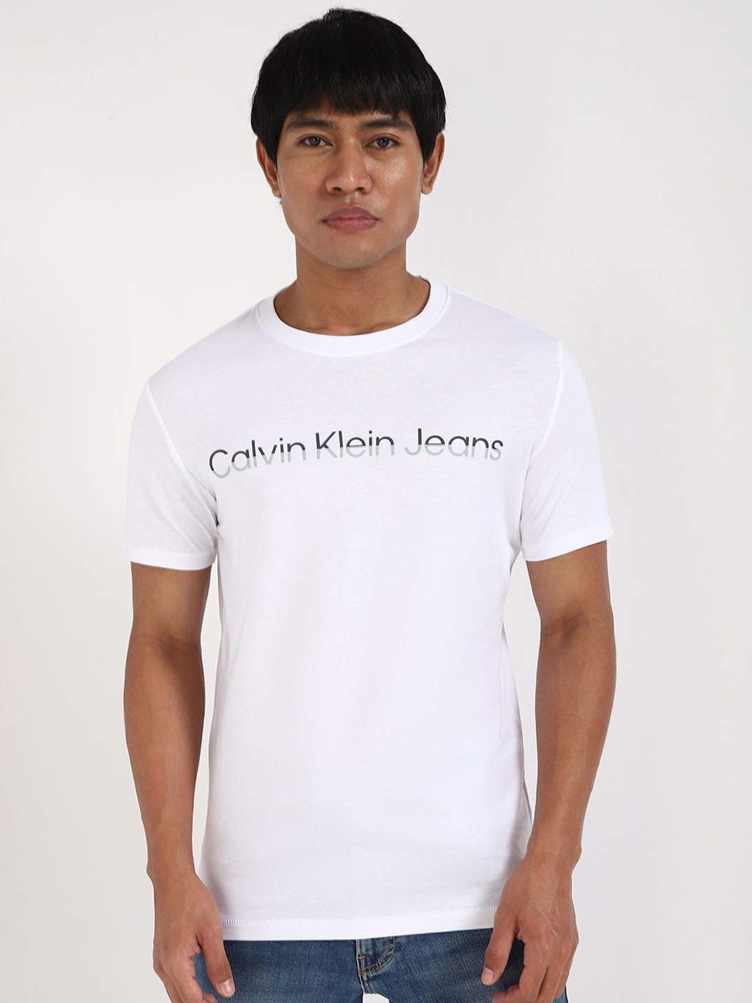 

Calvin Klein Jeans Men Typography Printed Round Neck Cotton T-shirt, White