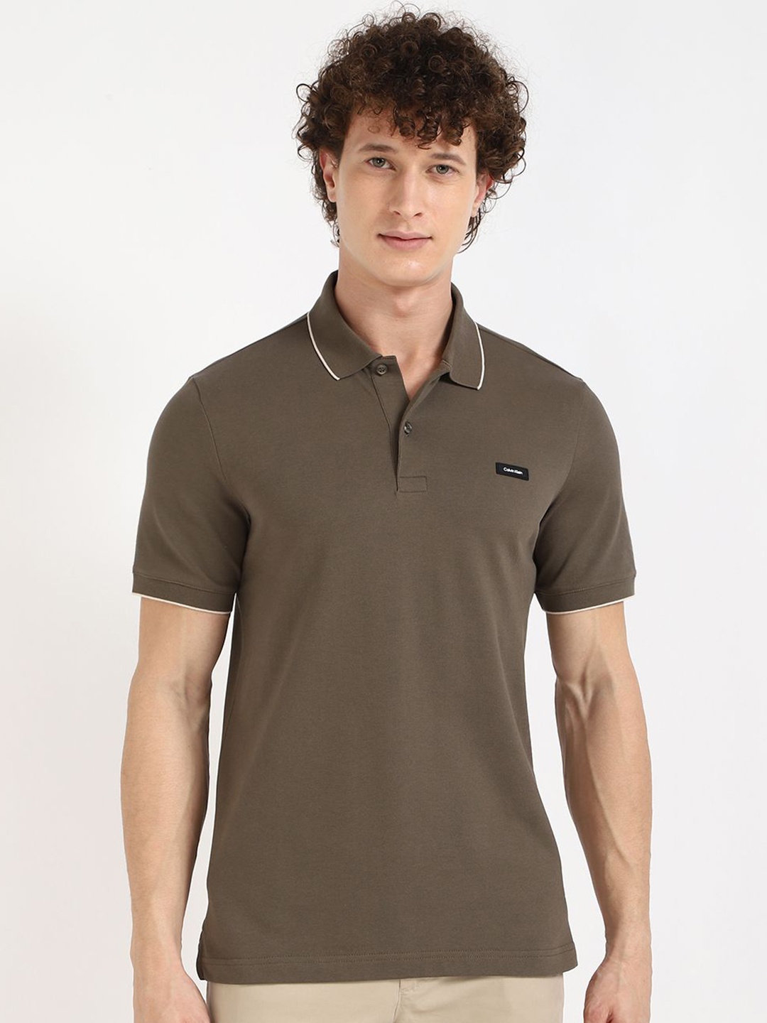 

Calvin Klein Jeans Men Solid Polo Collar Cotton T-shirt, Brown