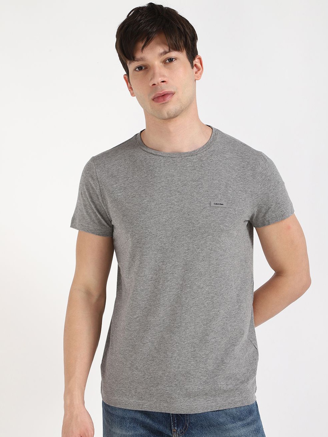 

Calvin Klein Jeans Men Solid Round Neck Cotton T-shirt, Grey