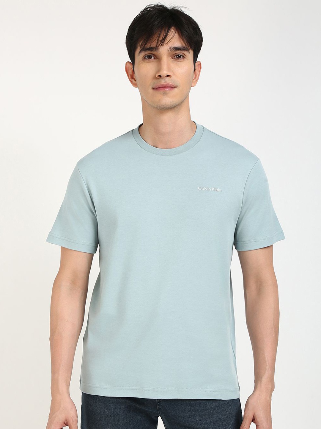 

Calvin Klein Jeans Men MICRO LOGO INTERLOCK Solid Round Neck Cotton T-shirt, Blue