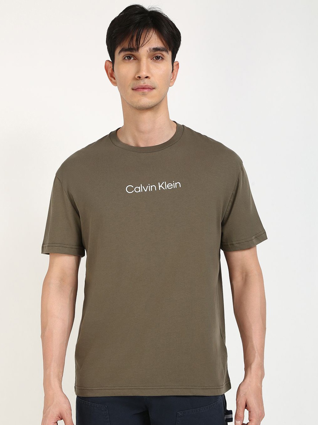 

Calvin Klein Jeans Men Typography Printed Round Neck Cotton T-shirt, Olive