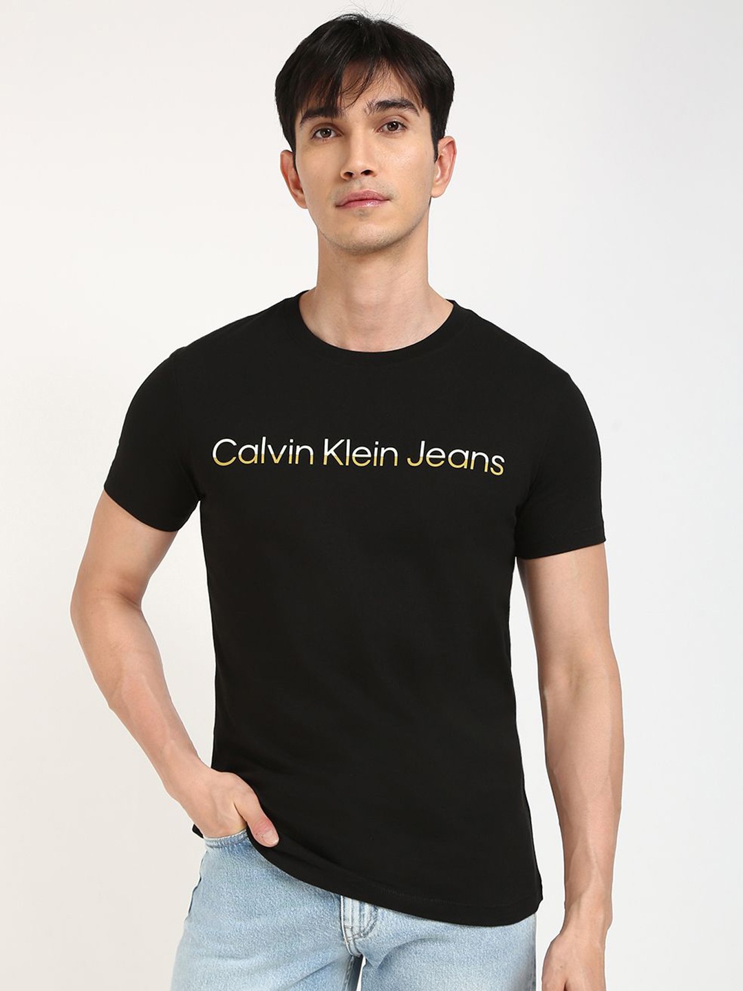 

Calvin Klein Jeans Men MIXED Typography Printed Round Neck Cotton T-shirt, Black