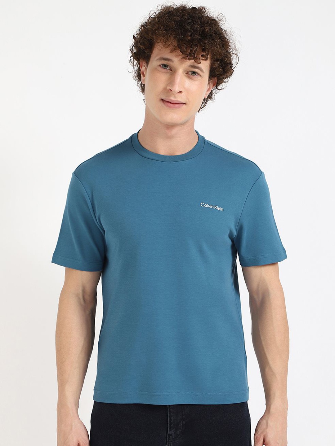 

Calvin Klein Jeans Men Solid Round Neck Cotton T-shirt, Blue